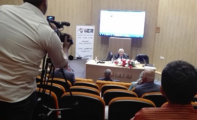 Mrs. Warda attending a seminar titled (the Central Bank and the Economic Reform Policy)