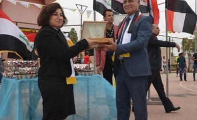 The Presidency of Al-Hamdaniya University awards Mrs. Pascale Warda the shield of the university entitled 