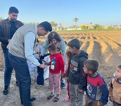 As Part of its Campaign to Help the Poor: Hammurabi Organization Distributes Winter Clothing in al-Yusufiyah Sub-District, South of Baghdad